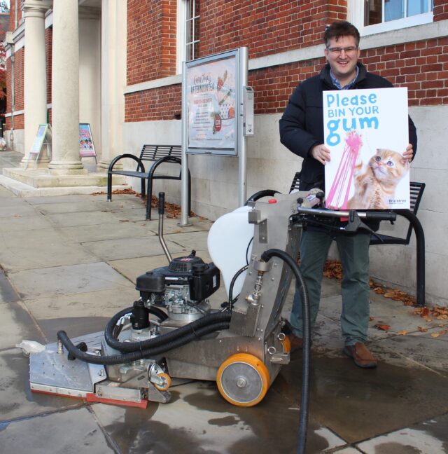 Cllr Tom Cunningham with Gladiater Gum machine and campaign Bin your gum