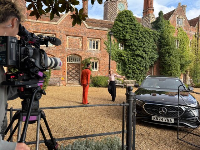 Johannes Radebe and Alex Kingston meet in front of St Osyth Priory. Image from St Osyth Priory